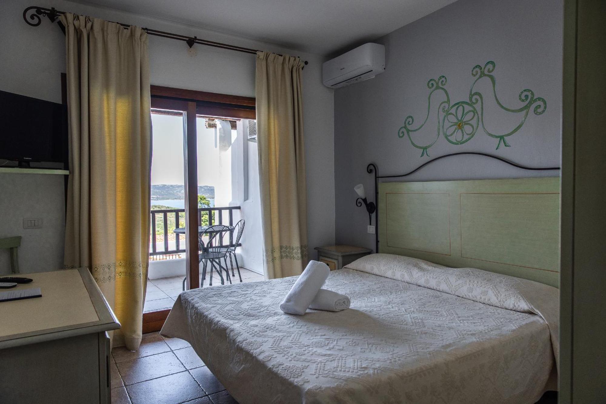 Hotel Pedra Santa Байя Сардиния Экстерьер фото